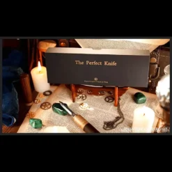 The Perfect Knife magic prop, an elegant prediction device crafted from African rosewood, brass, and zinc alloy, designed by Hongzhi Wang, Jay Wang, and TCC Magic for instant mind-reading performances.