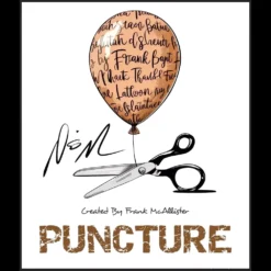Close-up view of a hand holding a balloon that appears to be signed and restored, illustrating the 'Puncture' magic trick by Francis Mcallister.