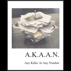 Adam Daniel demonstrating the Any Killer At Any Number (AKAAN) magic trick, featuring a stack of torn photographs and a suspenseful reveal.