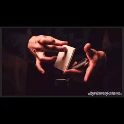 Promotional image for Matthew Cope's Magic Masterclass video course, featuring a magician's hands demonstrating a card trick.