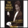 Kazu Katayama The Magic Odyssey I video tutorial cover showing a close-up of a magician's hands manipulating a deck of playing cards, creating an illusion.