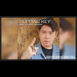 Cover image for Bond Lee, Wenzi, MS Magic Hopping Key instant download video, showing a hand holding a gold and silver key, symbolizing the vanishing key magic trick.