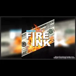 Marcos Cruz demonstrating the FIRE INK magic trick, where heat from fingers makes selected card digits visibly appear on a currency bill, showcasing the visual revelation from the instant download tutorial.