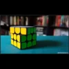 Magia Estudio Rubik's Cube Magic Course thumbnail, featuring a Rubik's Cube with dynamic lines and magical effects, indicating instant download video tutorials for mastering cube magic.
