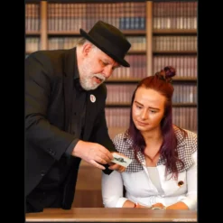 Mick Wilson demonstrating an unreleased magic trick from his Academy 2 masterclass, featuring card magic and mentalism effects.