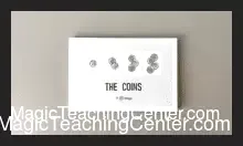 Close-up demonstration of JT Magic's The Coins packet trick, showing four coins mysteriously appearing or disappearing on specialized playing cards.