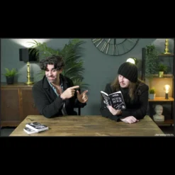 Simon Lipkin demonstrating powerful mentalism effects from his Triharder video download, featuring a key, padlock, and a song lyric book.