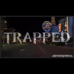 Erick White's TRAPPED magic trick, showing a signed playing card visibly appearing and sealed inside a clear Tic Tac box.