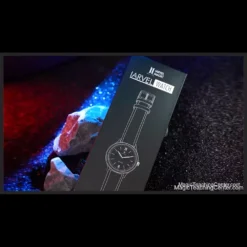 Sleek IARVEL Watch by Iarvel Magic & Bluether Magic, an app-controlled magic wristwatch displaying a precise time. The watch features a dark face, silver casing, and minimalist design, appearing as a high-end timepiece.