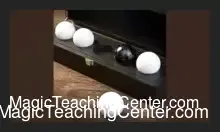 A set of five Sleuth Balls by Iarvel Magic, including four white balls and one black ball, typically used for a lie detection mentalism trick.