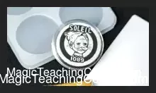 Soleil Pro magic trick kit by TCC and GBDL, featuring the advanced white chocolate-like chip, custom chocolate molds, and instructions for the remote 'Which Hand' effect and DIY chocolate coin illusions.