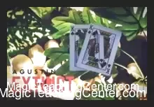 Agustin's Extinct magic trick showing a playing card visually dissolving between two empty card frames, demonstrating the vanishing illusion.