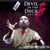 Paul Nathan performs 'Devil in the Deck' live, showcasing intricate card magic on stage with theatrical lighting and an overhead camera capturing the action.