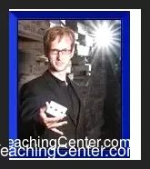 Oliver Tabor, a professional magician, presenting his 'Perceptions on Principles and Psychology' lecture, detailing stage magic, close-up magic, and mentalism techniques.