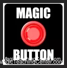 A magic button card with a red button, featuring a spectator's signed playing card visibly fused to its back, demonstrating Craig Petty's Magic Button trick.