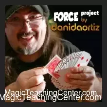 Dani DaOrtiz performing a precise card force with a deck of playing cards, featuring the official 'The Force Project COMPLETE' course branding.