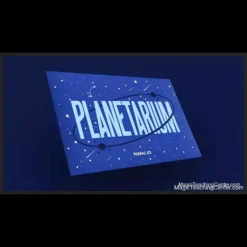 A close-up view of a smartphone flashlight shining through a specially punched card, projecting a magical constellation of stars onto a wall, which visually realigns to reveal a playing card.