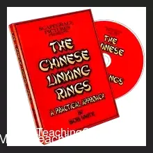 Bob White performing the Chinese Linking Rings magic trick, showcasing linked and unlinked metal rings in a captivating demonstration.