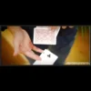 Alex Hansford demonstrating the Gödel card trick, performing an open, face-up color change where a playing card visibly transforms with a wave of his hands, showcasing the magical effect.