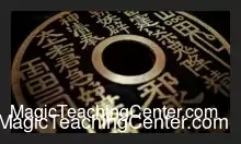 Avi Yap performing 'Threaded' coin magic routine, demonstrating the Charming Chinese Challenge with coins on a string for the instant download video tutorial.