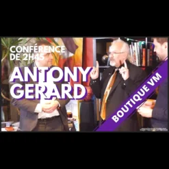 Antony Gerard teaching advanced card magic techniques, demonstrating a specific card force or routine with a deck of cards at his professional magic conference.