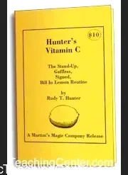 Ebook cover for Rudy Hunter's Vitamin C, depicting a lemon, a dollar bill, and magical elements, representing the gaffless Bill In Lemon magic trick.