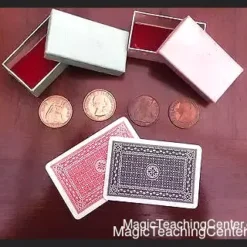 Robert Swadling's Swadling Swindles magic set, featuring gimmicked coins, playing cards, an instruction manual, and two classic old English pennies.