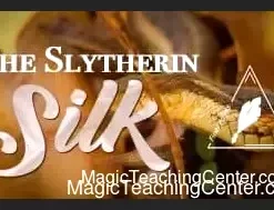 Alexander Slemmer performing or teaching a captivating silk magic trick for a standup audience, demonstrating the 'Slytherin Silks' technique from Conjuror Community's masterclass.